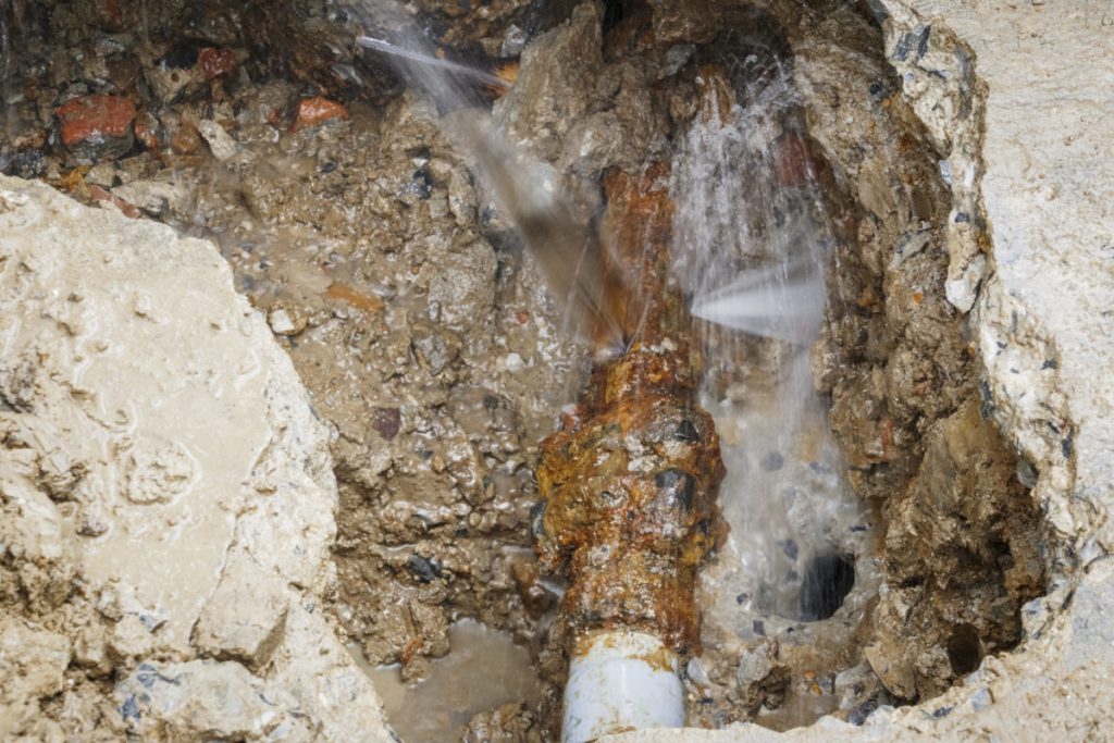 water leak found underneath pavement